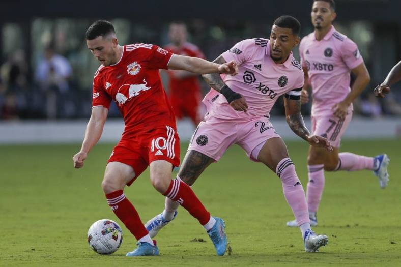 May 22, 2022; Fort Lauderdale, Florida, USA; New York Red Bulls midfielder Lewis Morgan (10) protects the ball from Inter Miami CF midfielder Gregore (26) during the first half at DRV PNK Stadium. Mandatory Credit: Sam Navarro-USA TODAY Sports