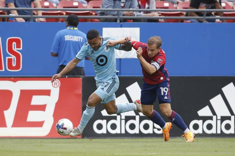 May 22, 2022; Frisco, Texas, USA; Minnesota United defender D.J. Taylor (27) and FC Dallas midfielder Paxton Pomykal (19) fight for the ball in the first half at Toyota Stadium. Mandatory Credit: Tim Heitman-USA TODAY Sports