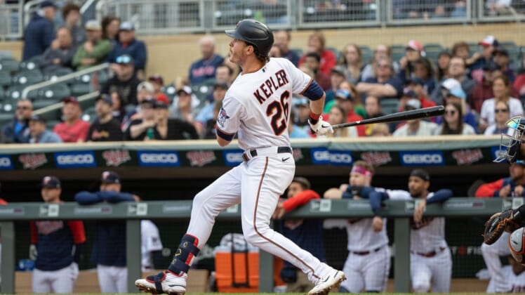 May 23, 2022; Minneapolis, Minnesota, USA; Minnesota Twins right fielder Max Kepler (26) hits grand slam during the first inning against the Detroit Tigers at Target Field. Mandatory Credit: Jordan Johnson-USA TODAY Sports