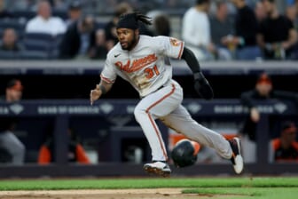 May 23, 2022; Bronx, New York, USA; Baltimore Orioles center fielder Cedric Mullins (31) scores a run on a single by left fielder Austin Hays (not pictured) during the third inning against the New York Yankees at Yankee Stadium. Mandatory Credit: Brad Penner-USA TODAY Sports