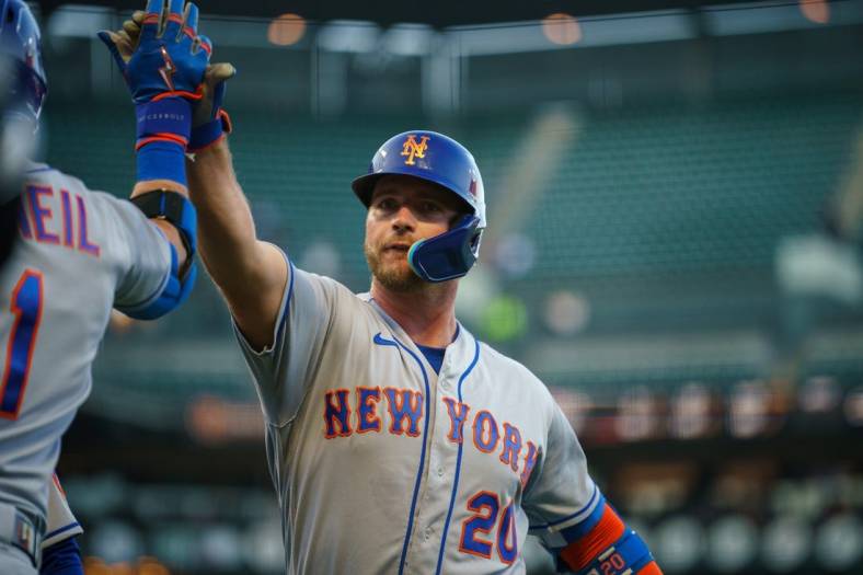 May 23, 2022; San Francisco, California, USA;  New York Mets first baseman Pete Alonso (20) gets high fives by New York Mets second baseman Jeff McNeil (1) during the third inning against the San Francisco Giants at Oracle Park. Mandatory Credit: Neville E. Guard-USA TODAY Sports