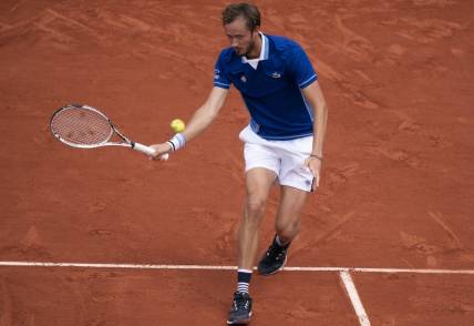 May 24, 2022; Paris, France; Daniil Medvedev returns a shot from Fecund Bagnis (ARG) during their match on day three of the French Open at Stade Roland-Garros.Mandatory Credit: Susan Mullane-USA TODAY Sports