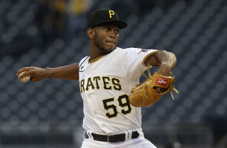 May 24, 2022; Pittsburgh, Pennsylvania, USA;  Pittsburgh Pirates starting pitcher Roansy Contreras (59) delivers a pitch against the Colorado Rockies during the first inning at PNC Park. Mandatory Credit: Charles LeClaire-USA TODAY Sports