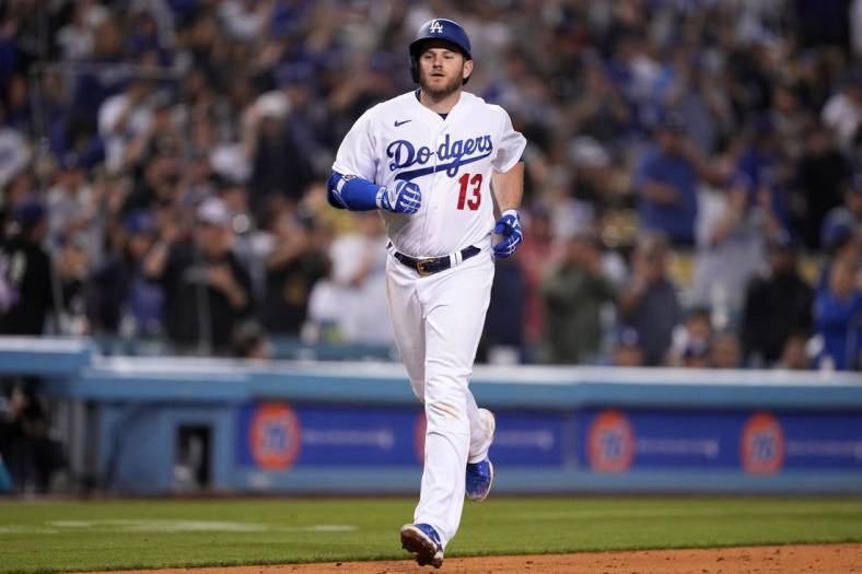 May 4, 2022; Los Angeles, California, USA; Los Angeles Dodgers third baseman Max Muncy (13) rounds the bases after hitting a two-run home run in the eighth inning against the San Francisco Giants at Dodger Stadium. Mandatory Credit: Kirby Lee-USA TODAY Sports