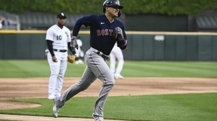 May 24, 2022; Chicago, Illinois, USA; Boston Red Sox center fielder Enrique Hernandez (5) heads to home plate after hitting a solo home run against the Chicago White Sox during the first inning at Guaranteed Rate Field. Mandatory Credit: Matt Marton-USA TODAY Sports