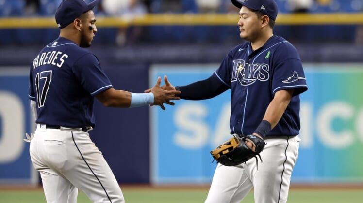 May 24, 2022; St. Petersburg, Florida, USA; Tampa Bay Rays shortstop Isaac Paredes (17) and first baseman Ji-Man Choi (26) congratulate each other as they beat the Miami Marlins at Tropicana Field. Mandatory Credit: Kim Klement-USA TODAY Sports