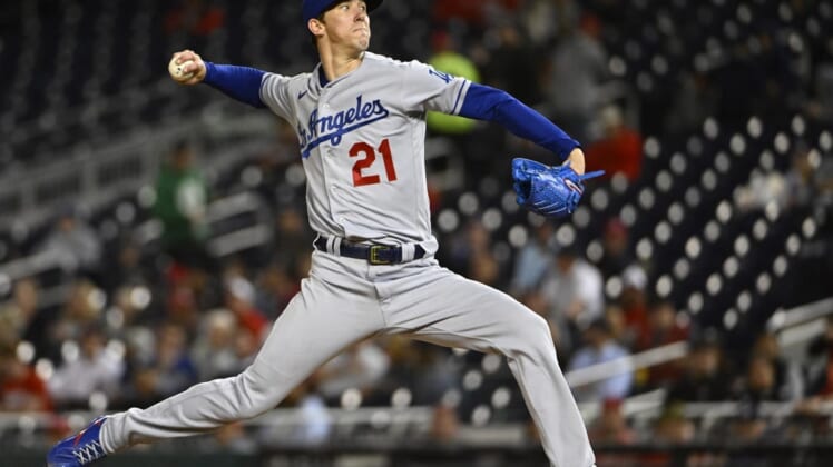 May 24, 2022; Washington, District of Columbia, USA; Los Angeles Dodgers starting pitcher Walker Buehler (21) throws to the Washington Nationals during the sixth inning at Nationals Park. Mandatory Credit: Brad Mills-USA TODAY Sports