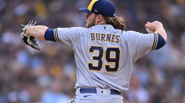 May 24, 2022; San Diego, California, USA; Milwaukee Brewers starting pitcher Corbin Burnes (39) throws a pitch against the San Diego Padres during the first inning at Petco Park. Mandatory Credit: Orlando Ramirez-USA TODAY Sports