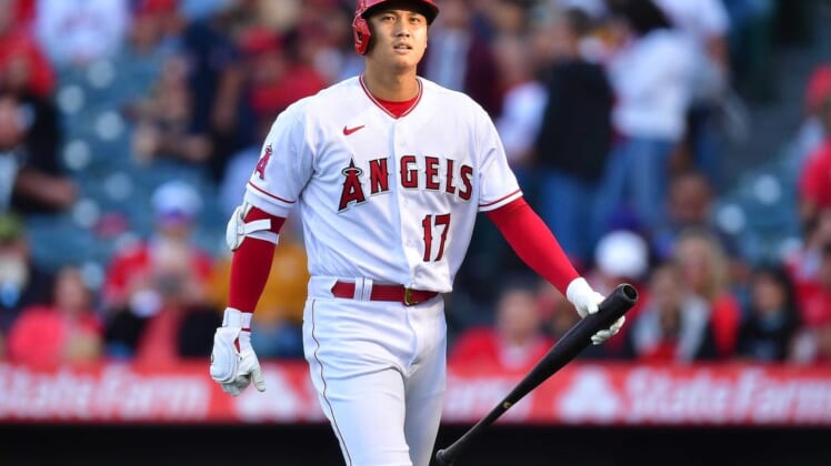 May 24, 2022; Anaheim, California, USA; Los Angeles Angels designated hitter Shohei Ohtani (17) reacts after striking out against the Texas Rangers during the first inning at Angel Stadium. Mandatory Credit: Gary A. Vasquez-USA TODAY Sports