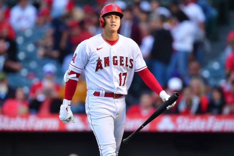 May 24, 2022; Anaheim, California, USA; Los Angeles Angels designated hitter Shohei Ohtani (17) reacts after striking out against the Texas Rangers during the first inning at Angel Stadium. Mandatory Credit: Gary A. Vasquez-USA TODAY Sports