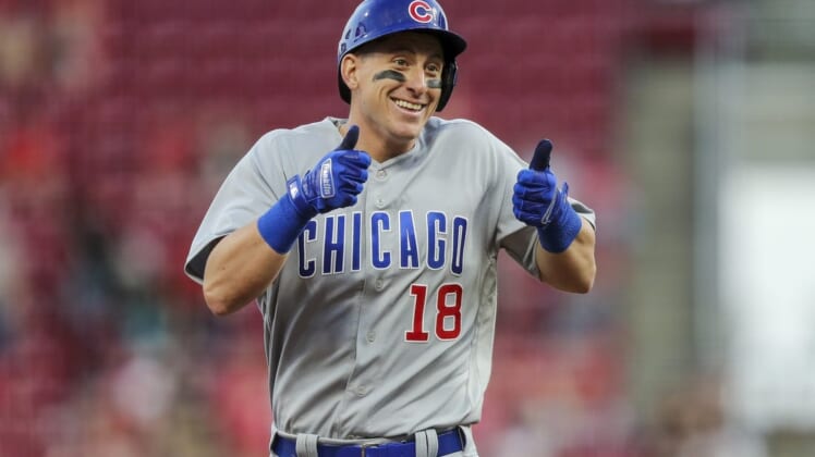 May 24, 2022; Cincinnati, Ohio, USA; Chicago Cubs first baseman Frank Schwindel (18) reacts after hitting a solo home run against the Cincinnati Reds in the fifth inning at Great American Ball Park. Mandatory Credit: Katie Stratman-USA TODAY Sports