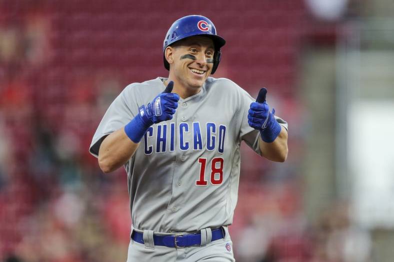 May 24, 2022; Cincinnati, Ohio, USA; Chicago Cubs first baseman Frank Schwindel (18) reacts after hitting a solo home run against the Cincinnati Reds in the fifth inning at Great American Ball Park. Mandatory Credit: Katie Stratman-USA TODAY Sports