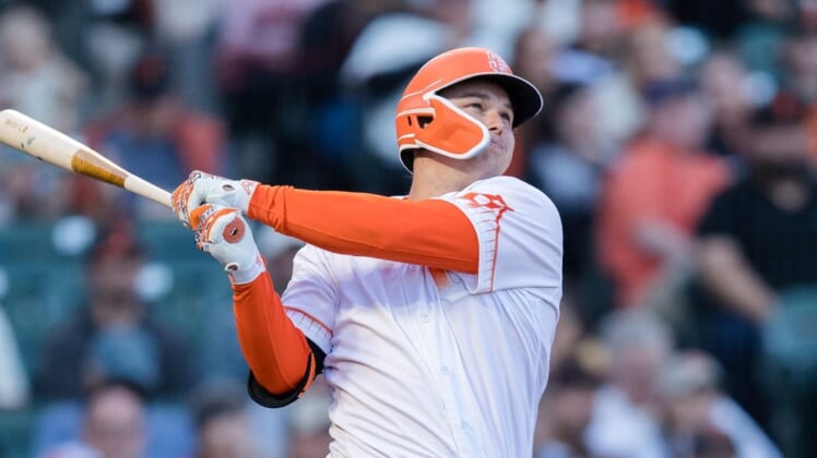 May 24, 2022; San Francisco, California, USA; San Francisco Giants left fielder Joc Pederson (23) hits a two-run home run against the New York Mets during the third inning at Oracle Park. Mandatory Credit: John Hefti-USA TODAY Sports