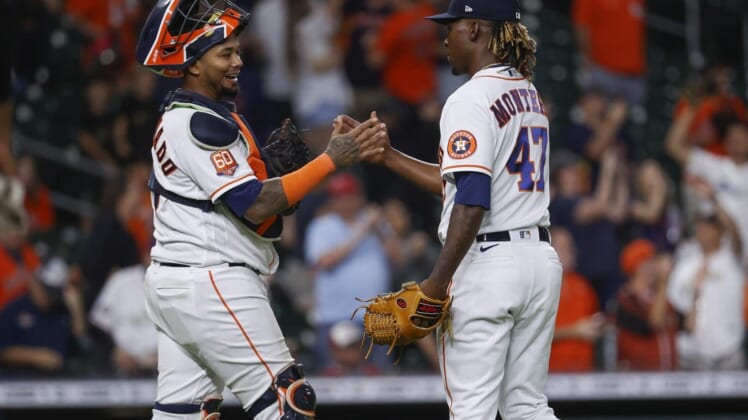 May 24, 2022; Houston, Texas, USA; Houston Astros relief pitcher Rafael Montero (47) celebrates with catcher Martin Maldonado (15) after the Astros defeated the Cleveland Guardians at Minute Maid Park. Mandatory Credit: Troy Taormina-USA TODAY Sports