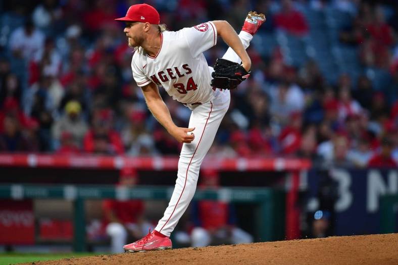 May 24, 2022; Anaheim, California, USA; Los Angeles Angels starting pitcher Noah Syndergaard (34) throws against the Texas Rangers during the fifth inning at Angel Stadium. Mandatory Credit: Gary A. Vasquez-USA TODAY Sports