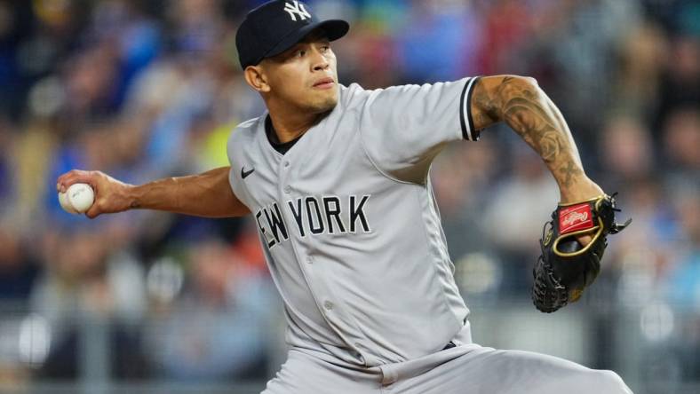 Apr 29, 2022; Kansas City, Missouri, USA; New York Yankees relief pitcher Jonathan Loaisiga (43) pitches against the Kansas City Royals during the sixth inning at Kauffman Stadium. Mandatory Credit: Jay Biggerstaff-USA TODAY Sports