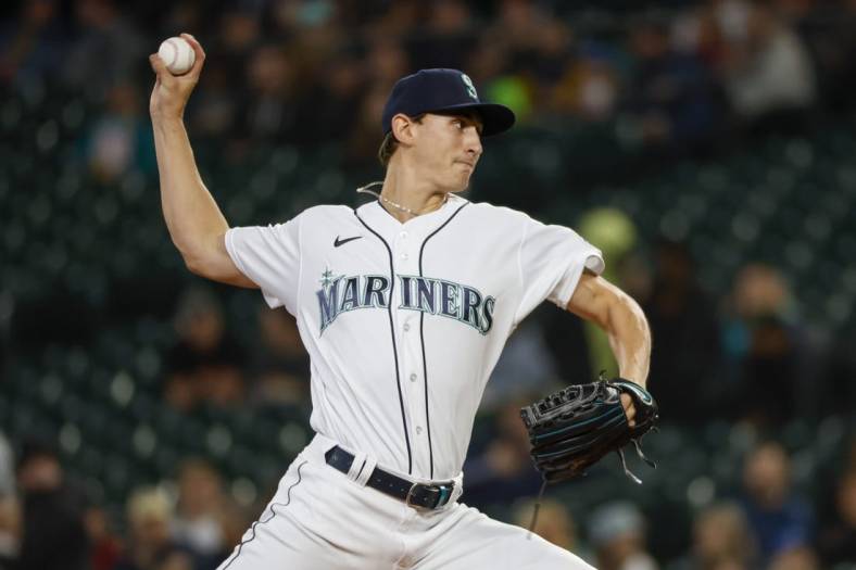 May 24, 2022; Seattle, Washington, USA; Seattle Mariners starting pitcher George Kirby (68) throws against the Oakland Athletics during the first inning at T-Mobile Park. Mandatory Credit: Joe Nicholson-USA TODAY Sports