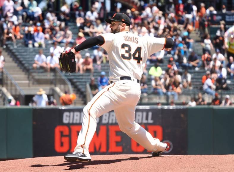 May 25, 2022; San Francisco, California, USA; San Francisco Giants starting pitcher Jakob Junis (34) pitches the ball against the New York Mets during the first inning at Oracle Park. Mandatory Credit: Kelley L Cox-USA TODAY Sports