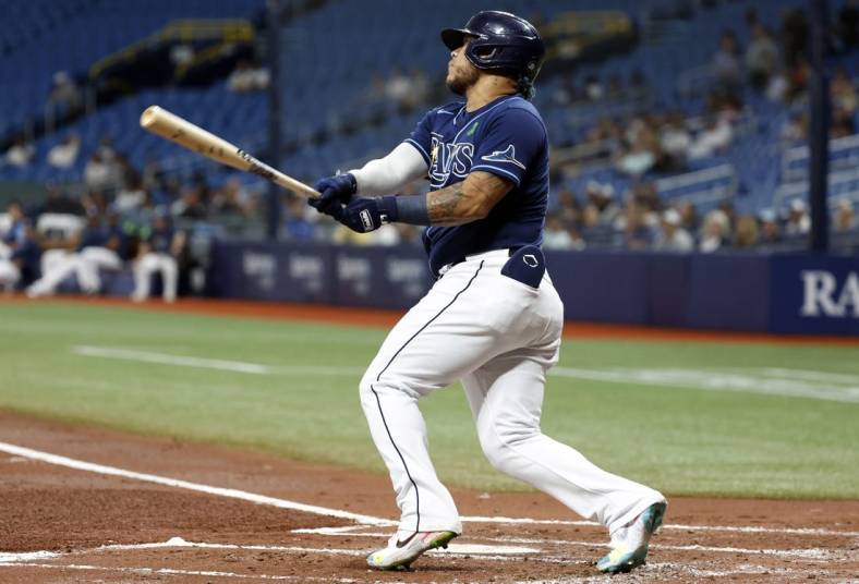 May 25, 2022; St. Petersburg, Florida, USA;Tampa Bay Rays left fielder Harold Ramirez (43) hits a 2-run home run during the first inning against the Miami Marlins at Tropicana Field. Mandatory Credit: Kim Klement-USA TODAY Sports