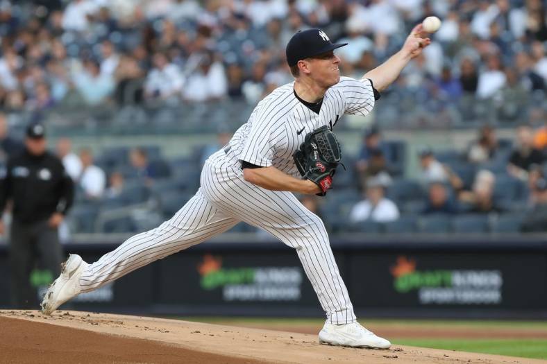 May 25, 2022; Bronx, New York, USA; New York Yankees starting pitcher JP Sears (92) pitches against the Baltimore Orioles during the first inning at Yankee Stadium. Mandatory Credit: Tom Horak-USA TODAY Sports