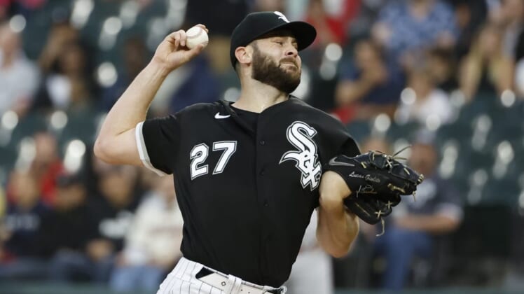 May 25, 2022; Chicago, Illinois, USA; Chicago White Sox starting pitcher Lucas Giolito (27) delivers against the Boston Red Sox during the first inning at Guaranteed Rate Field. Mandatory Credit: Kamil Krzaczynski-USA TODAY Sports