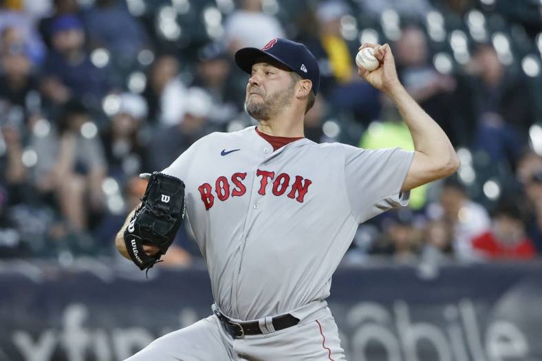May 25, 2022; Chicago, Illinois, USA; Boston Red Sox starting pitcher Rich Hill (44) delivers against the Chicago White Sox during the first inning at Guaranteed Rate Field. Mandatory Credit: Kamil Krzaczynski-USA TODAY Sports