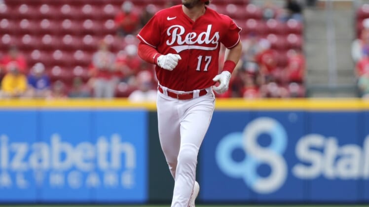 May 26, 2022; Cincinnati, Ohio, USA; Cincinnati Reds shortstop Kyle Farmer (17) runs the bases after hitting a two-run home run against the Chicago Cubs during the second inning at Great American Ball Park. Mandatory Credit: David Kohl-USA TODAY Sports