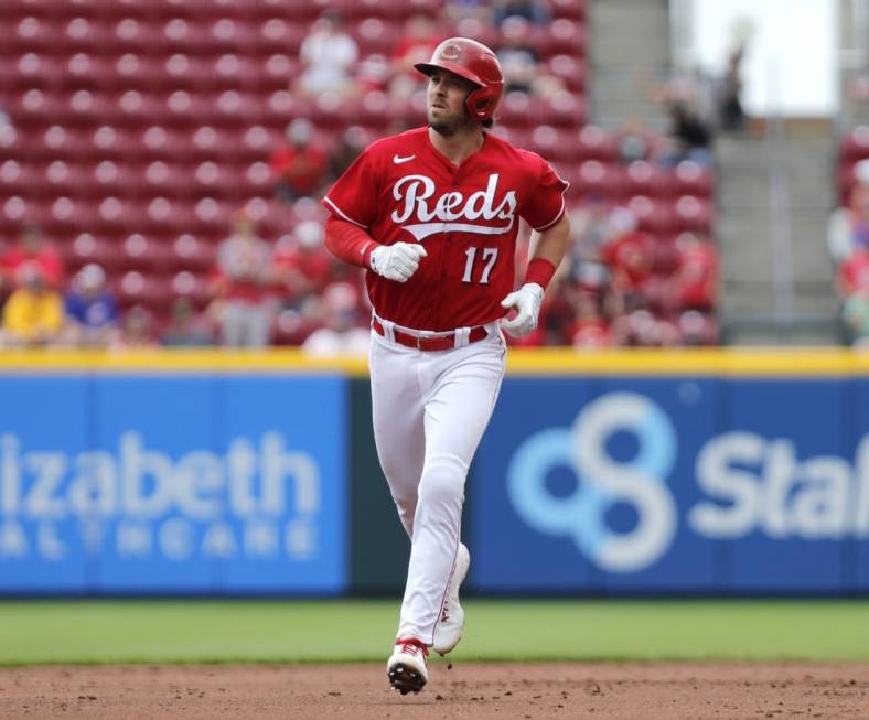 May 26, 2022; Cincinnati, Ohio, USA; Cincinnati Reds shortstop Kyle Farmer (17) runs the bases after hitting a two-run home run against the Chicago Cubs during the second inning at Great American Ball Park. Mandatory Credit: David Kohl-USA TODAY Sports