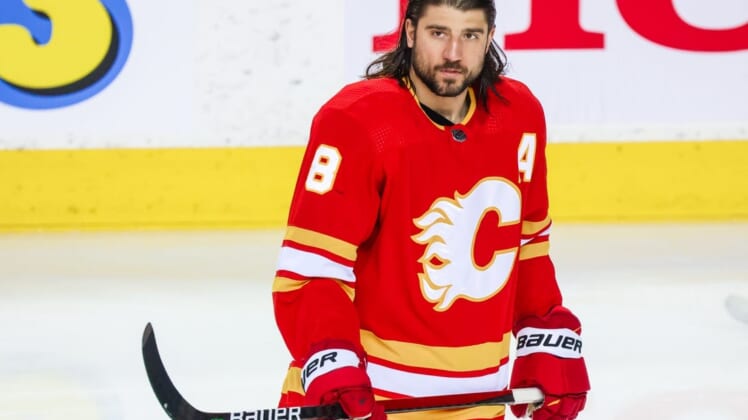 May 26, 2022; Calgary, Alberta, CAN; Calgary Flames defenseman Christopher Tanev (8) skates during the warmup period against the Edmonton Oilers in game five of the second round of the 2022 Stanley Cup Playoffs at Scotiabank Saddledome. Mandatory Credit: Sergei Belski-USA TODAY Sports