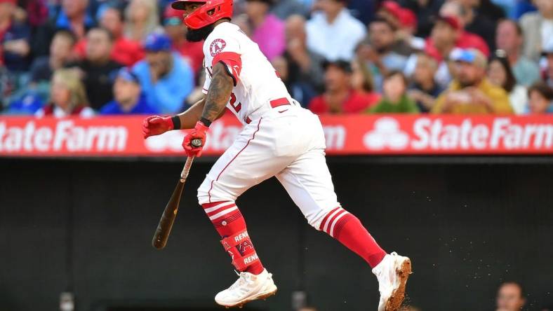 May 26, 2022; Anaheim, California, USA; Los Angeles Angels second baseman Luis Rengifo (2) hits an RBI single against the Toronto Blue Jays during the third inning at Angel Stadium. Mandatory Credit: Gary A. Vasquez-USA TODAY Sports