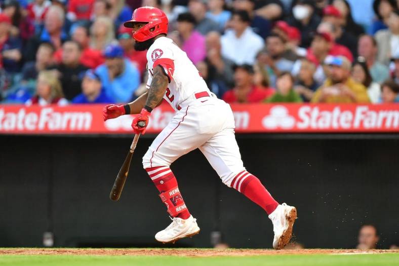 May 26, 2022; Anaheim, California, USA; Los Angeles Angels second baseman Luis Rengifo (2) hits an RBI single against the Toronto Blue Jays during the third inning at Angel Stadium. Mandatory Credit: Gary A. Vasquez-USA TODAY Sports