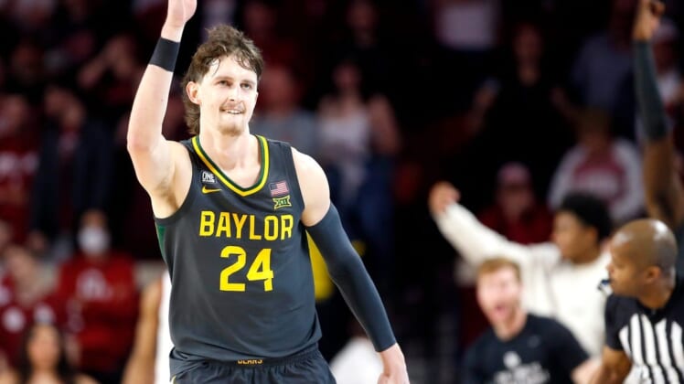 Matthew Mayer celebrates a successful 3-pointer during Baylor   s victory at Oklahoma in January.Syndication The Oklahoman