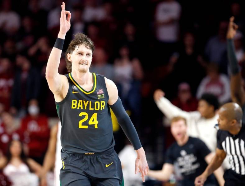 Matthew Mayer celebrates a successful 3-pointer during Baylor   s victory at Oklahoma in January.

Syndication The Oklahoman