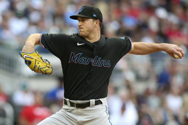 May 27, 2022; Atlanta, Georgia, USA; Miami Marlins starting pitcher Trevor Rogers (28) throws against the Atlanta Braves in the first inning at Truist Park. Mandatory Credit: Brett Davis-USA TODAY Sports