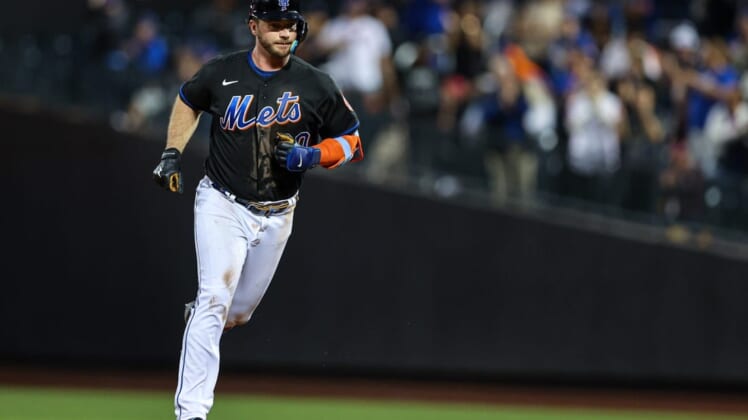 May 27, 2022; New York City, New York, USA; New York Mets designated hitter Pete Alonso (20) runs the base path after hitting a two run home run against the Philadelphia Phillies during the third inning at Citi Field. Mandatory Credit: Vincent Carchietta-USA TODAY Sports