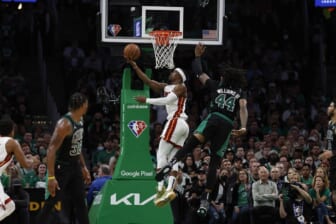 May 27, 2022; Boston, Massachusetts, USA; Miami Heat forward Jimmy Butler (22) shoots ahead of Boston Celtics center Robert Williams III (44) during the second half in game six of the 2022 eastern conference finals at TD Garden. Mandatory Credit: Winslow Townson-USA TODAY Sports
