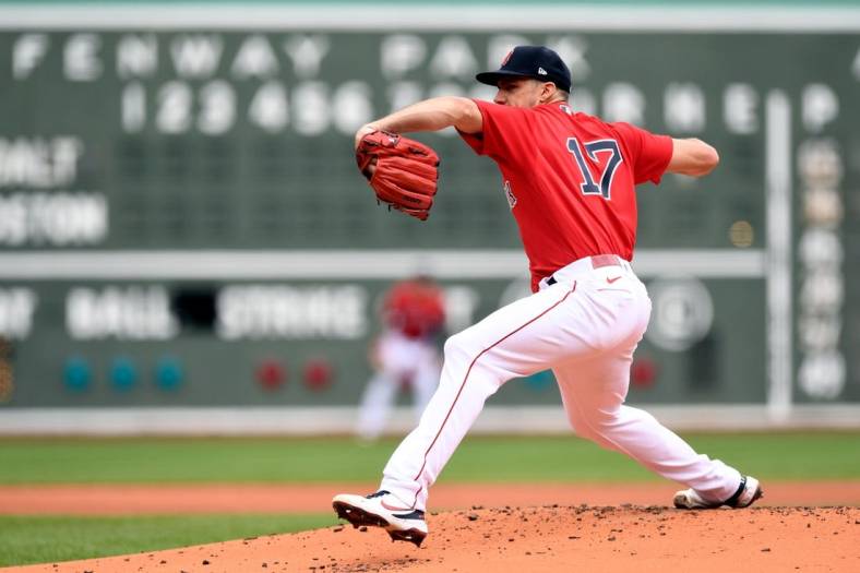 May 28, 2022; Boston, Massachusetts, USA; Boston Red Sox starting pitcher Nathan Eovaldi (17) pitches against the Baltimore Orioles during the first inning at Fenway Park. Mandatory Credit: Brian Fluharty-USA TODAY Sports