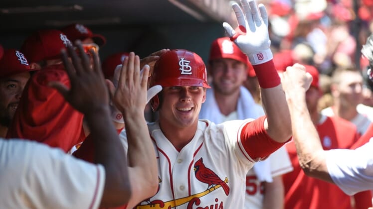 May 28, 2022; St. Louis, Missouri, USA; St. Louis Cardinals second baseman Nolan Gorman (16) is congratulated after hitting his first home run in the MLB against the Milwaukee Brewers during the first inning at Busch Stadium. Mandatory Credit: Joe Puetz-USA TODAY Sports