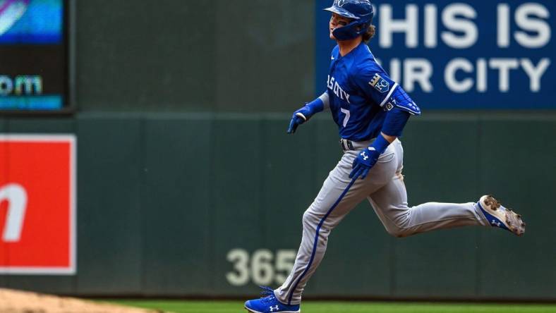 May 28, 2022; Minneapolis, Minnesota, USA;  Kansas City Royals shortstop Bobby Witt (7) runs to second on an RBI double against the Minnesota Twins during the third inning at Target Field. Mandatory Credit: Nick Wosika-USA TODAY Sports