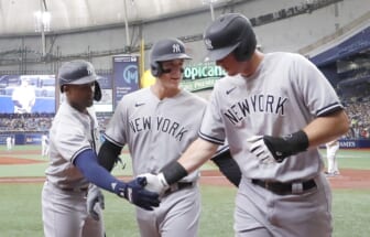 May 28, 2022; St. Petersburg, Florida, USA;  New York Yankees second baseman DJ LeMahieu, right, is congratulated on scoring by first baseman Anthony Rizzo (48) and second baseman Gleyber Torres, left, during the first inning against the Tampa Bay Rays at Tropicana Field. Mandatory Credit: Reinhold Matay-USA TODAY Sports