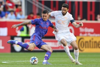May 28, 2022; Harrison, New Jersey, USA; New York Red Bulls forward Patryk Klimala (9) plays the ball against D.C. United defender Steve Birnbaum (15) during the first half at Red Bull Arena. Mandatory Credit: Vincent Carchietta-USA TODAY Sports