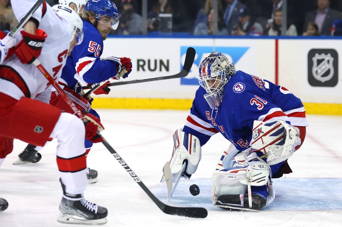 May 28, 2022; New York, New York, USA; New York Rangers goaltender Igor Shesterkin (31) makes a save against the Carolina Hurricanes during the first period of game six of the second round of the 2022 Stanley Cup Playoffs at Madison Square Garden. Mandatory Credit: Brad Penner-USA TODAY Sports