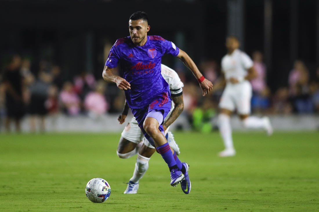May 28, 2022; Fort Lauderdale, Florida, USA; Portland Timbers midfielder Cristhian Paredes (22) runs with the ball against Inter Miami CF during the first half at DRV PNK Stadium. Mandatory Credit: Sam Navarro-USA TODAY Sports