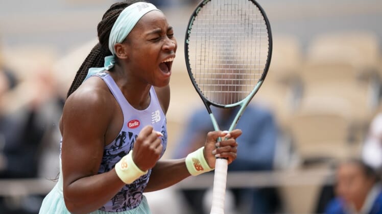 May 29, 2022; Paris, France; Coco Gauff (USA) celebrates winning her match against Elise Mertens (BEL) during their match on day eight of the French Open at Stade Roland-Garros. Mandatory Credit: Susan Mullane-USA TODAY Sports