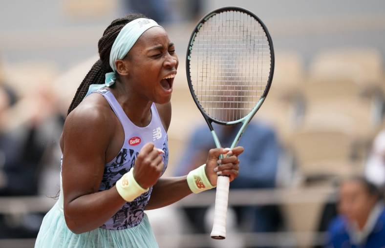 May 29, 2022; Paris, France; Coco Gauff (USA) celebrates winning her match against Elise Mertens (BEL) during their match on day eight of the French Open at Stade Roland-Garros. Mandatory Credit: Susan Mullane-USA TODAY Sports