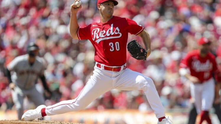May 29, 2022; Cincinnati, Ohio, USA; Cincinnati Reds starting pitcher Tyler Mahle (30) pitches against the San Francisco Giants in the second inning at Great American Ball Park. Mandatory Credit: Katie Stratman-USA TODAY Sports
