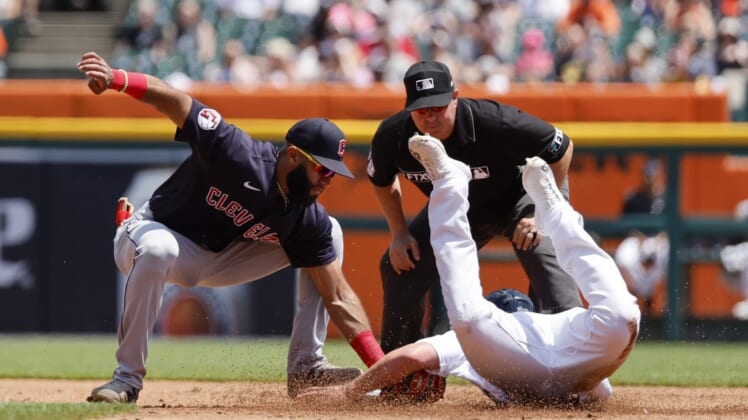 May 29, 2022; Detroit, Michigan, USA; Cleveland Guardians shortstop Amed Rosario (1) tags Detroit Tigers first baseman Spencer Torkelson (20) out trying to steal second in the second inning at Comerica Park. Mandatory Credit: Rick Osentoski-USA TODAY Sports