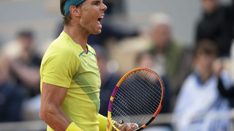 May 29, 2022; Paris, France; Rafael Nadal (ESP) reacts to a point during his match against Felix Auger-Aliassime (CAN) on day eight of the French Open at Stade Roland-Garros. Mandatory Credit: Susan Mullane-USA TODAY Sports