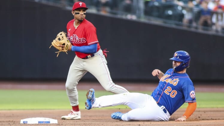 May 29, 2022; New York City, New York, USA;  New York Mets designated hitter Pete Alonso (20) is forced out at second by Philadelphia Phillies shortstop Johan Camargo (7) in the first inning at Citi Field. Mandatory Credit: Wendell Cruz-USA TODAY Sports