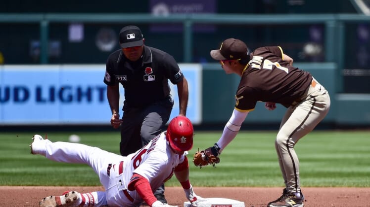 May 30, 2022; St. Louis, Missouri, USA;  San Diego Padres shortstop Ha-Seong Kim (7) tags out St. Louis Cardinals second baseman Nolan Gorman (16) during the first inning at Busch Stadium. Mandatory Credit: Jeff Curry-USA TODAY Sports